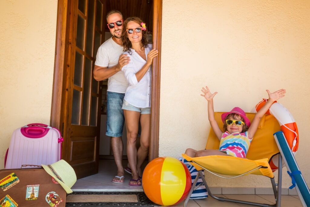 A happy family at a beach house