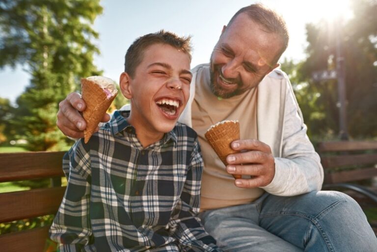 Charleston Ice Cream: A father and son share some laughs while enjoying ice cream cones while on vacation in Charleston, SC.